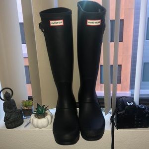 HUNTER rain boots.